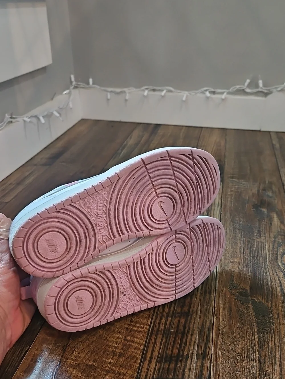 Nike White Low-Top Sneakers with Marbled Swoosh and Pink Details